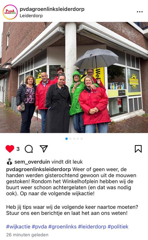 Groepsfoto regenachtige wijkactie Winkelhof voorjaar 2025